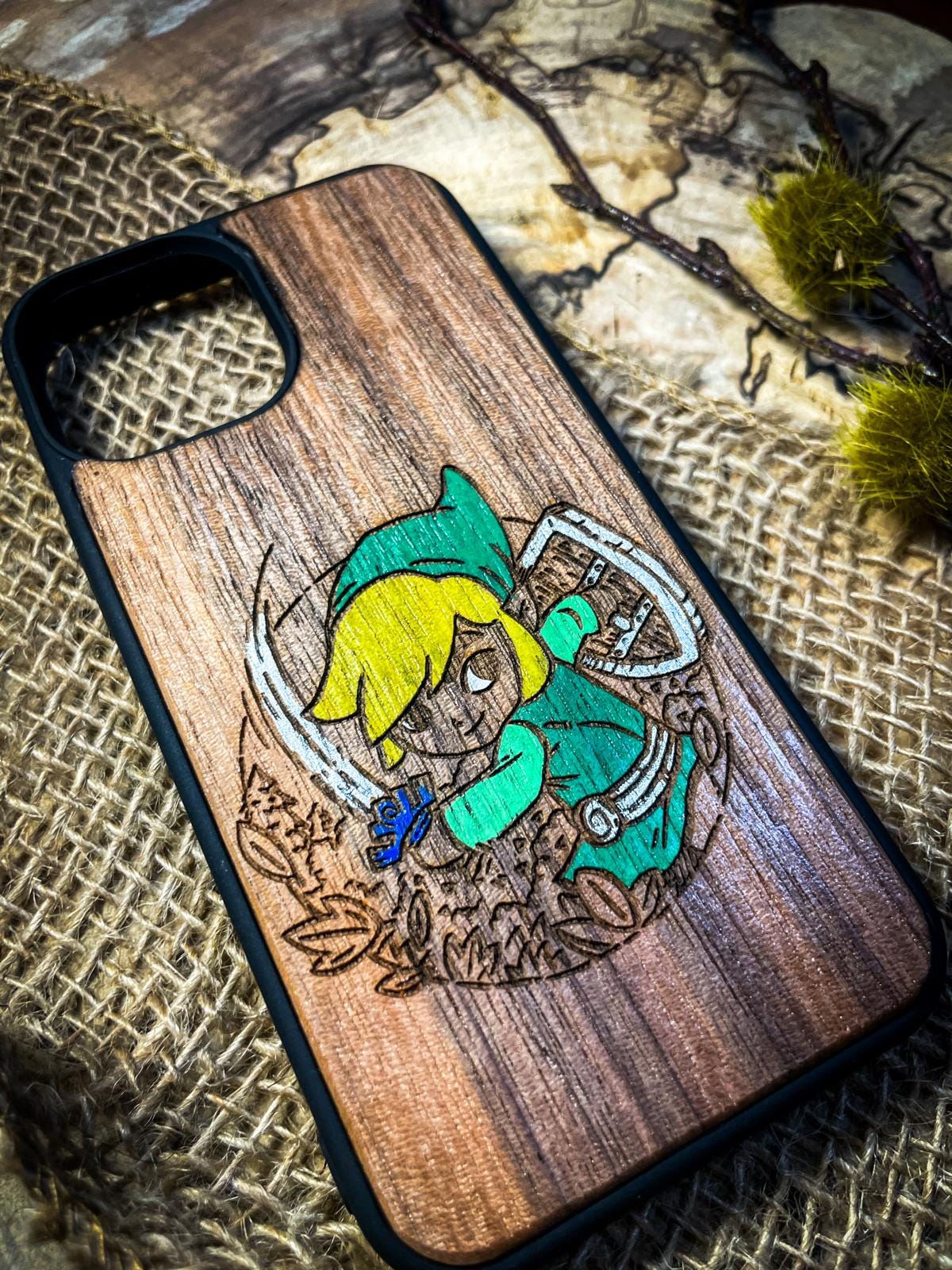 a wooden phone case with a picture of a girl on it