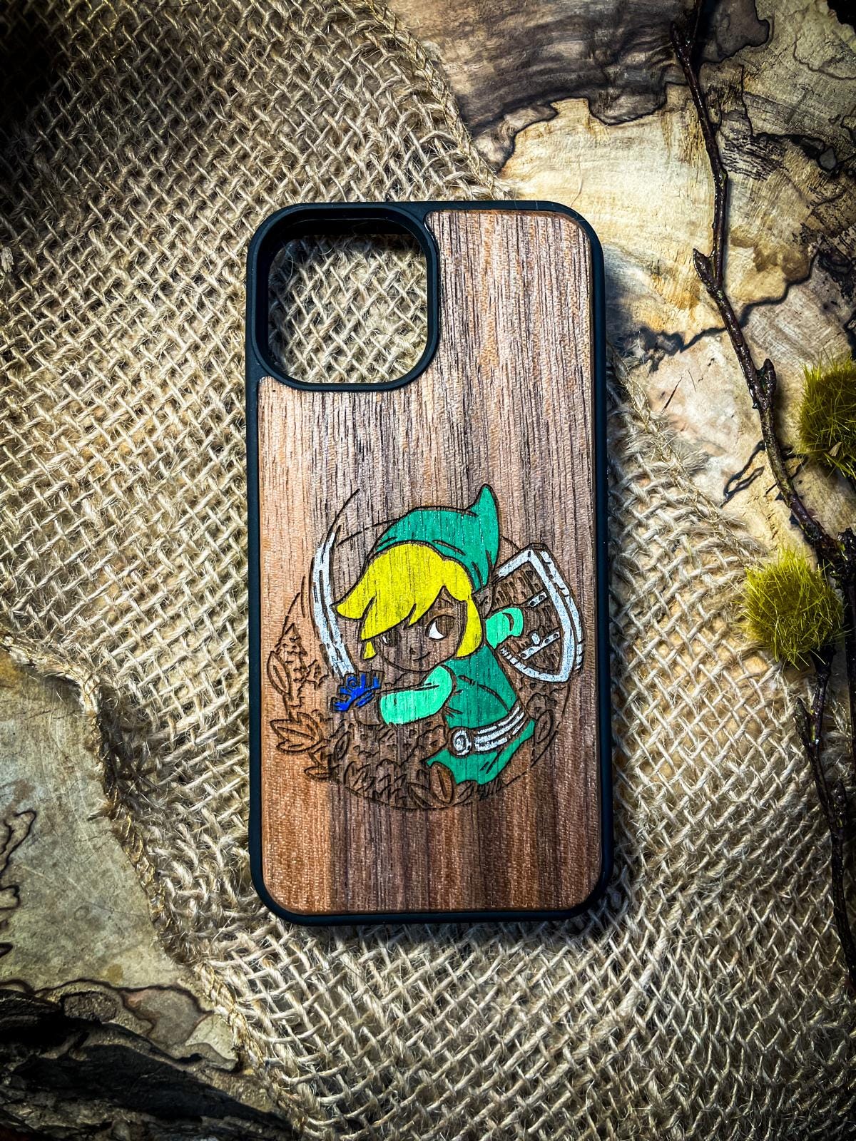 a wooden phone case with a picture of a girl on it