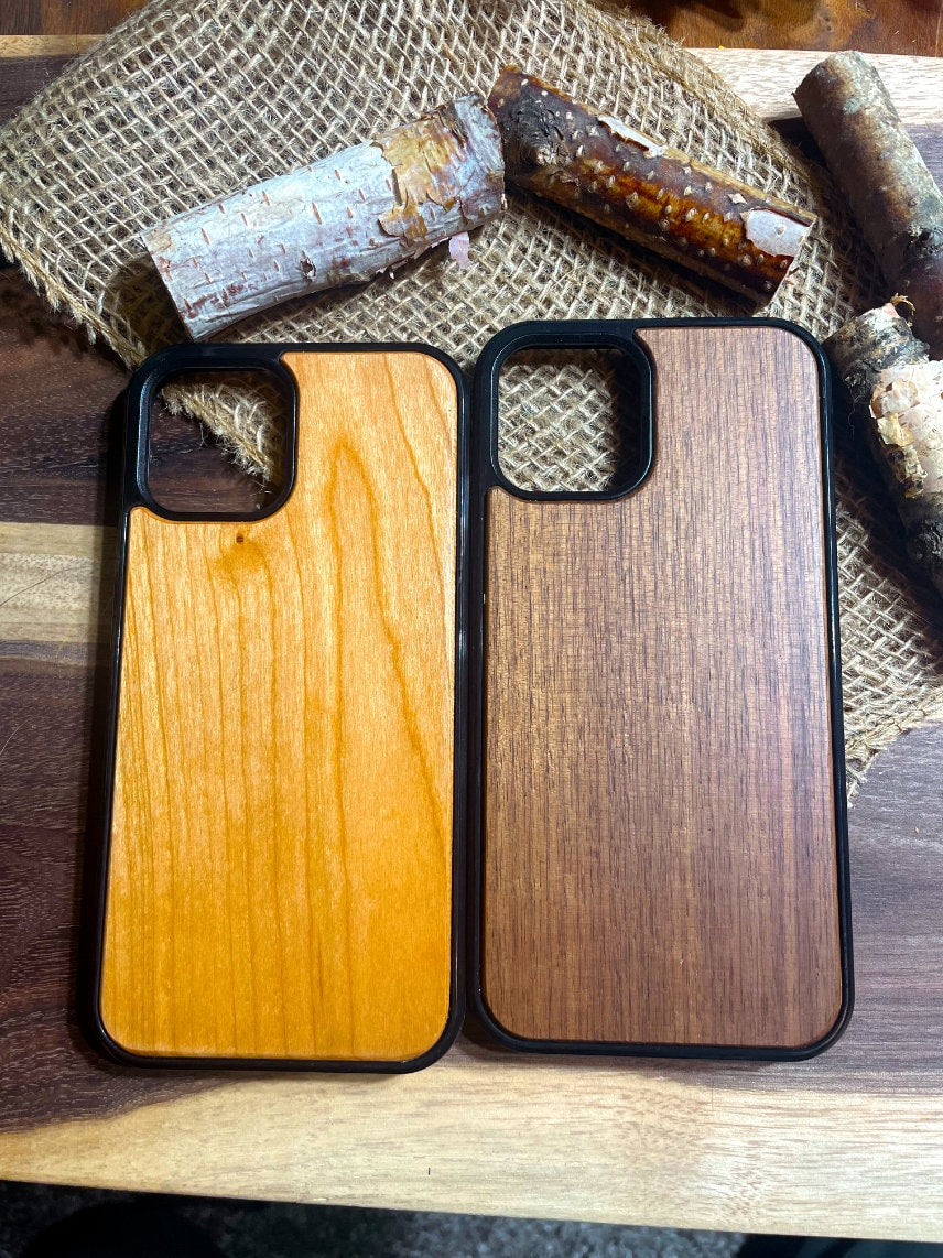 two wooden cases sitting on top of a wooden table