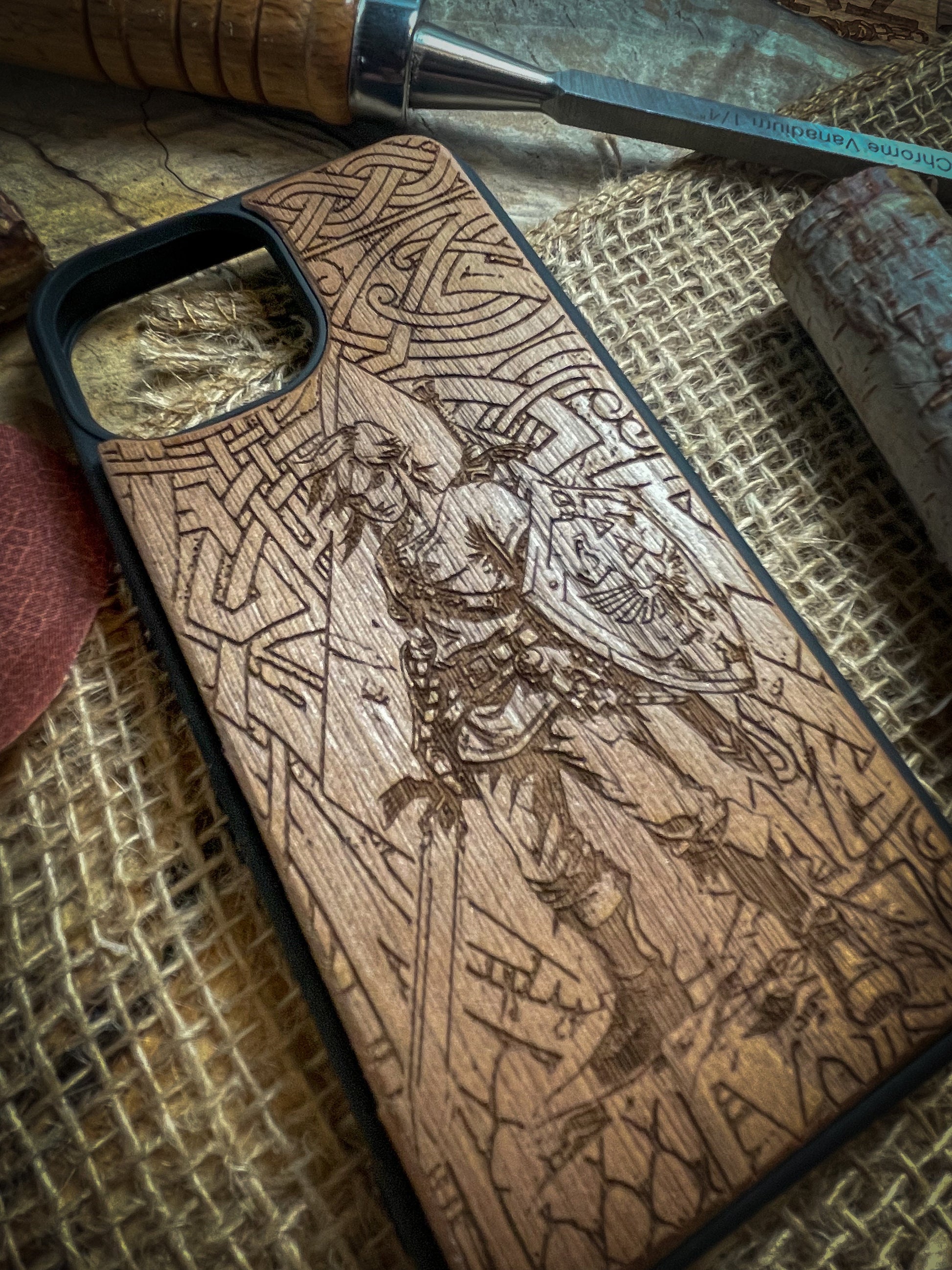 a wooden phone case with a picture of a man on it